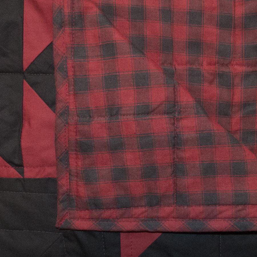 Black Feathered Star Quilt